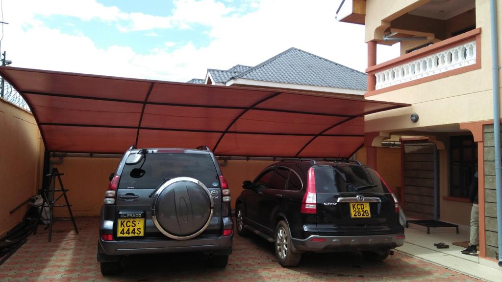 CURVED CARPORT-VEHICLE PARKING SHADE