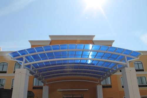 POLYCARBONATE COVERS FOR BUILDING ENTRANCE SUN SHADES AND CANOPIES- POLYCARBONATE SHADE FOR A FOYER OR LOBBY