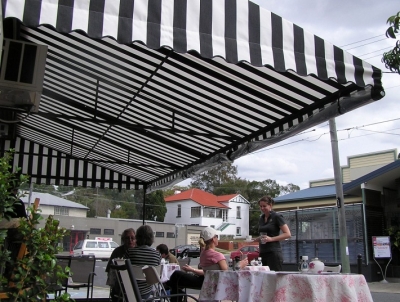 WINDOW AND DOOR AWNINGS-FIXED FRAME WEDGE CANOPY