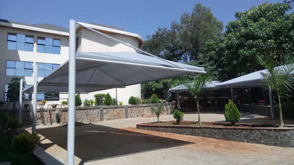 CAR PARKING SHADES FOR CORPORATE OFFICES-CARPORTS-CAR SHEDS-CAR CANOPY