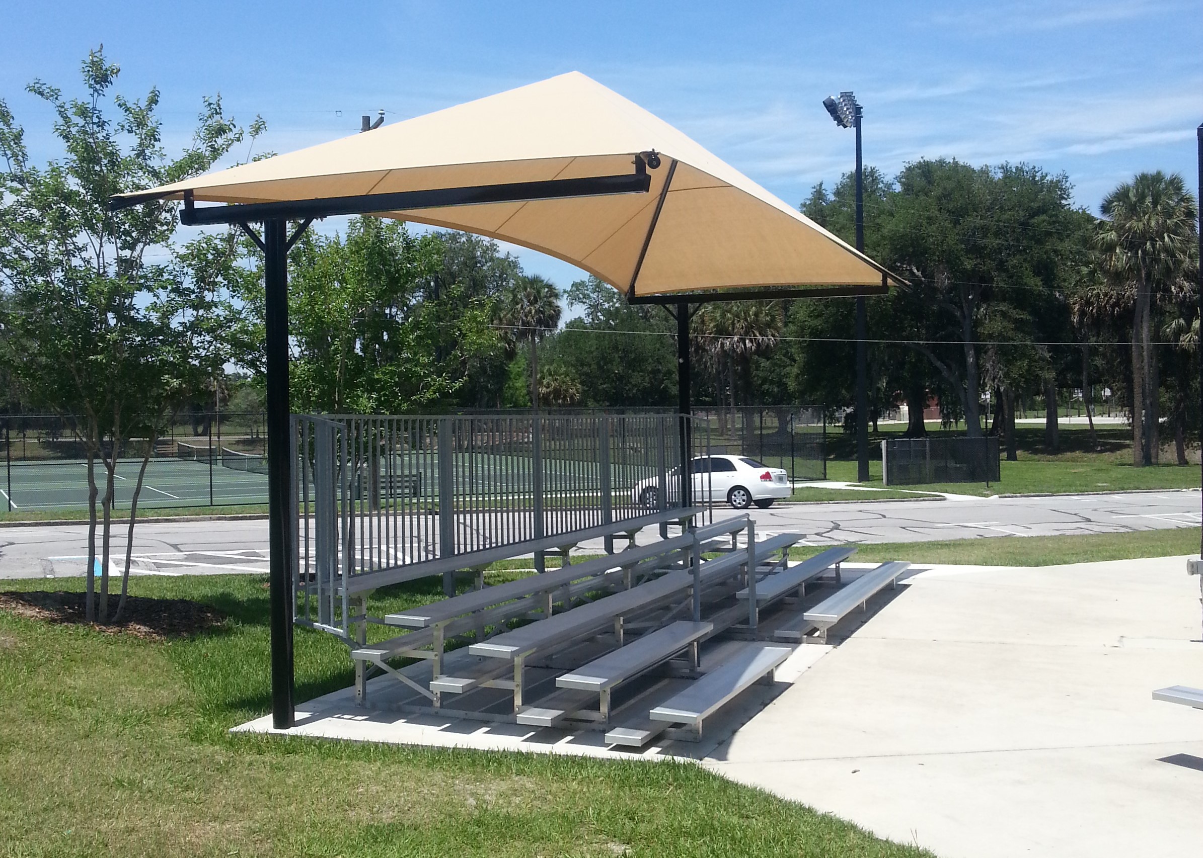 CANTILEVER CANOPY SHADES-SUN SHELTERS TO COVER PLAYGROUNDS, BLEACHERS, DUGOUTS, SPORTS FIELDS-SCHOOL CANOPY SHADES-OUTDOOR SHADES