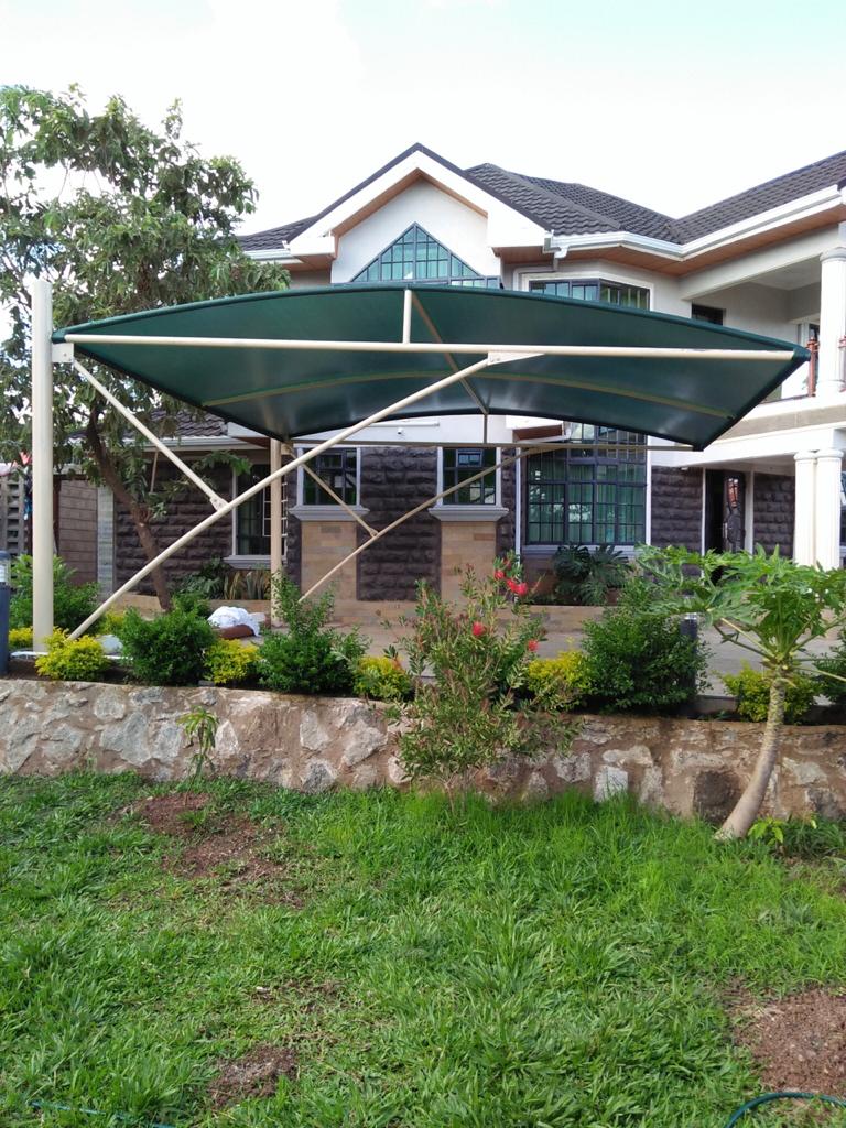 CARPORT-CAR SHADE FOR VILLAS-CANTILEVER CAR SHADE-CAR WASH SHADE-YARD PARKING SHADE-CURVED DOME PARKING SHADE-CAR PARK CANOPY SHED MANUFACTURING IN KILIFI