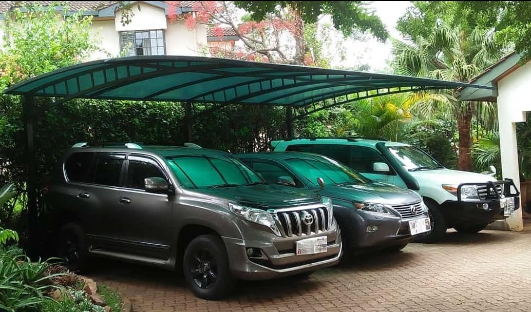 Modern-Carport-Installer-RUNDA-NAIROBI-Curved-Design-Car-Shade-Waterproof-Green-Shade-Net-Canopy-Vehicle Parking-Shade-Luxury-Outdoor-Shade-Parking-Tent-Garage