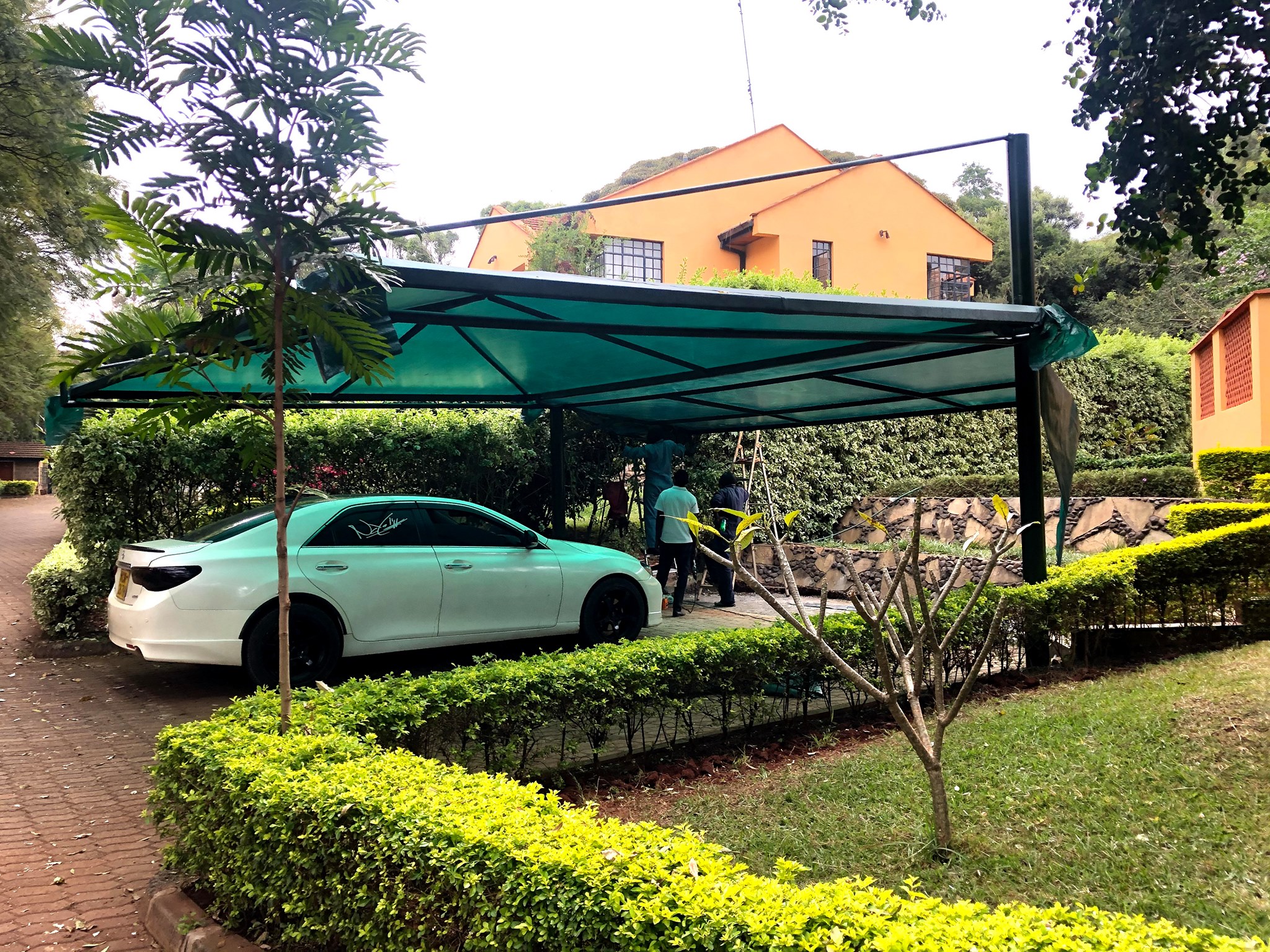 Unique and Modern Car Wash Shades and Carports-Yard Parking Lot Shades-Parking Shades-Vehicle Shade Canopies-Cantilever and Curved Shed designs-Waterproof Shade Net Car Covers-Commercial and Residential Car Shade Installers in Nyeri Kenya-