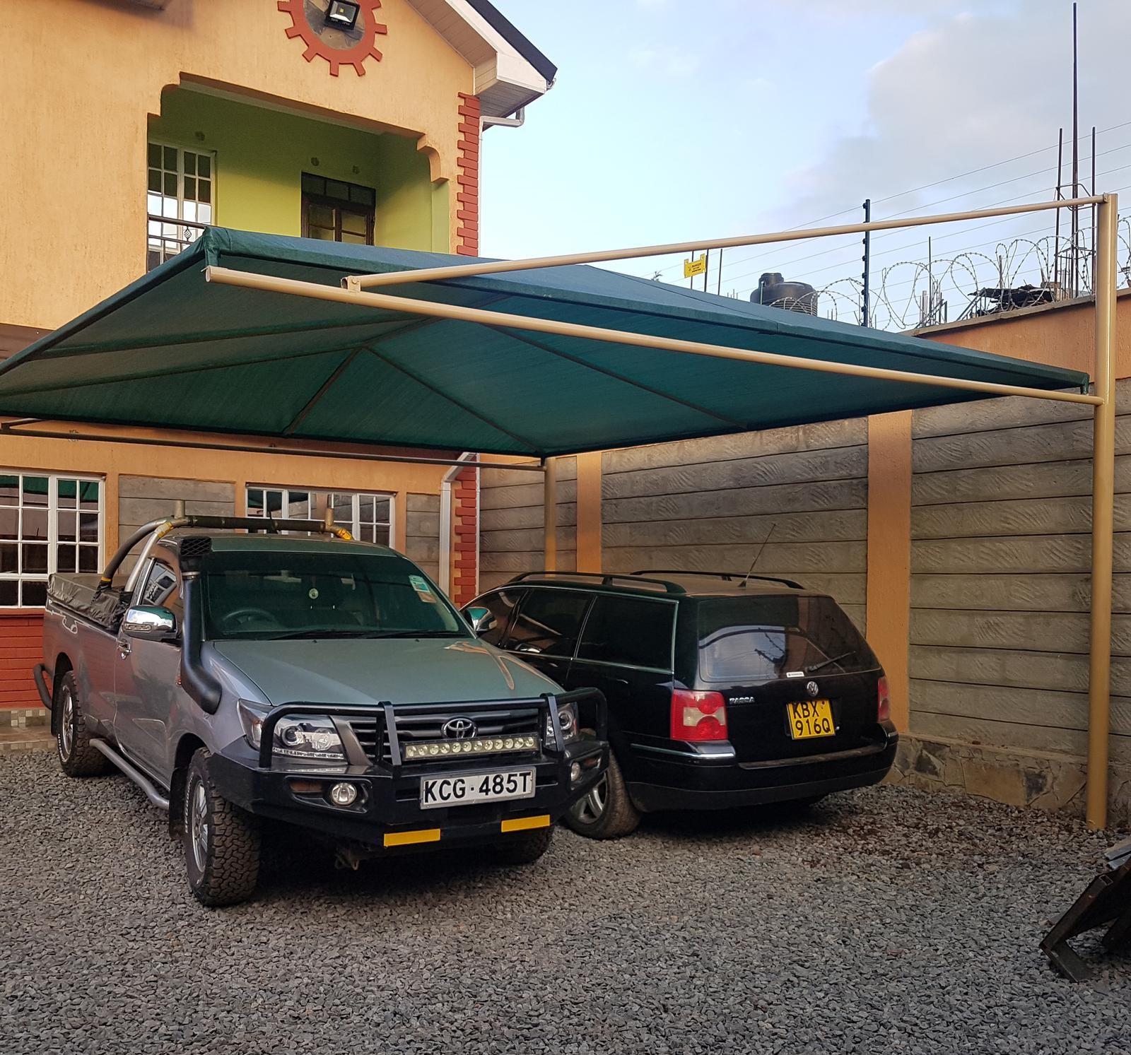 Unique and Modern Car Wash Shades and Carports-Yard Parking Lot Shades-Parking Shades-Vehicle Shade Canopies-Cantilever and Curved Shed designs-Waterproof Shade Net Car Covers-Commercial and Residential Car Shade Construction Company In Nairobi Kenya-We install the Carports all over the country including RUNDA-GARDEN ESTATE-RIDGEWAYS-THOME-MUTHAIGA-KITUSURU-LORESHO-KYUNA-REDHILL-NYARI-PEPONI ROAD-THIGIRI RIDGE-SPRING VALLEY-RIVERSIDE-WESTLANDS-PARKLANDS-HIGHRIDGE-UPPERHILL-JAMES GICHURU ROAD-LAVINGTON-KILELESHWA-KILIMANI-HURLINGHAM-NGONG-KAREN-LANG’ATA-NAIROBI WEST-NGUMO-MBAGATHI-RONGAI-KISERIAN-INDUSTRIAL AREA-SOUTH C-SOUTH B-MOMBASA ROAD-KITENGELA-ATHIRIVER-KATANI-SYOKIMAU-MACHAKOS-MAANZONI-LUKENYA-NAIVASHA-NAKURU-ELDORET-KISUMU-SIAYA-THIKA ROAD-KAHAWA WENDANI-KAMITI ROAD-JACARANDA-TATU CITY-KIJANI RIDGE-MEMBLEY-KAMAKIS-RUIRU-JUJA-THIKA-THIKA GREENS-KENYATTA ROAD-RUAKA-BANANA-MUCHATHA-KIAMBAA-KARURA-KIKUYU-LIMURU-KIAMBU-UTAWALA-RUAI-KAMULU-JOSKA-EMBAKASI-NANYUKI-NARUMORU-TIMAU-ISIOLO-MERU-EMBU-KERUGOYA-KUTUS-NYANDARUA-NYERI-MURANG’A-KARATINA-MANDERA-NAROK-MOMBASA-NYALI-BAMBURI-VIPINGO RIDGE-