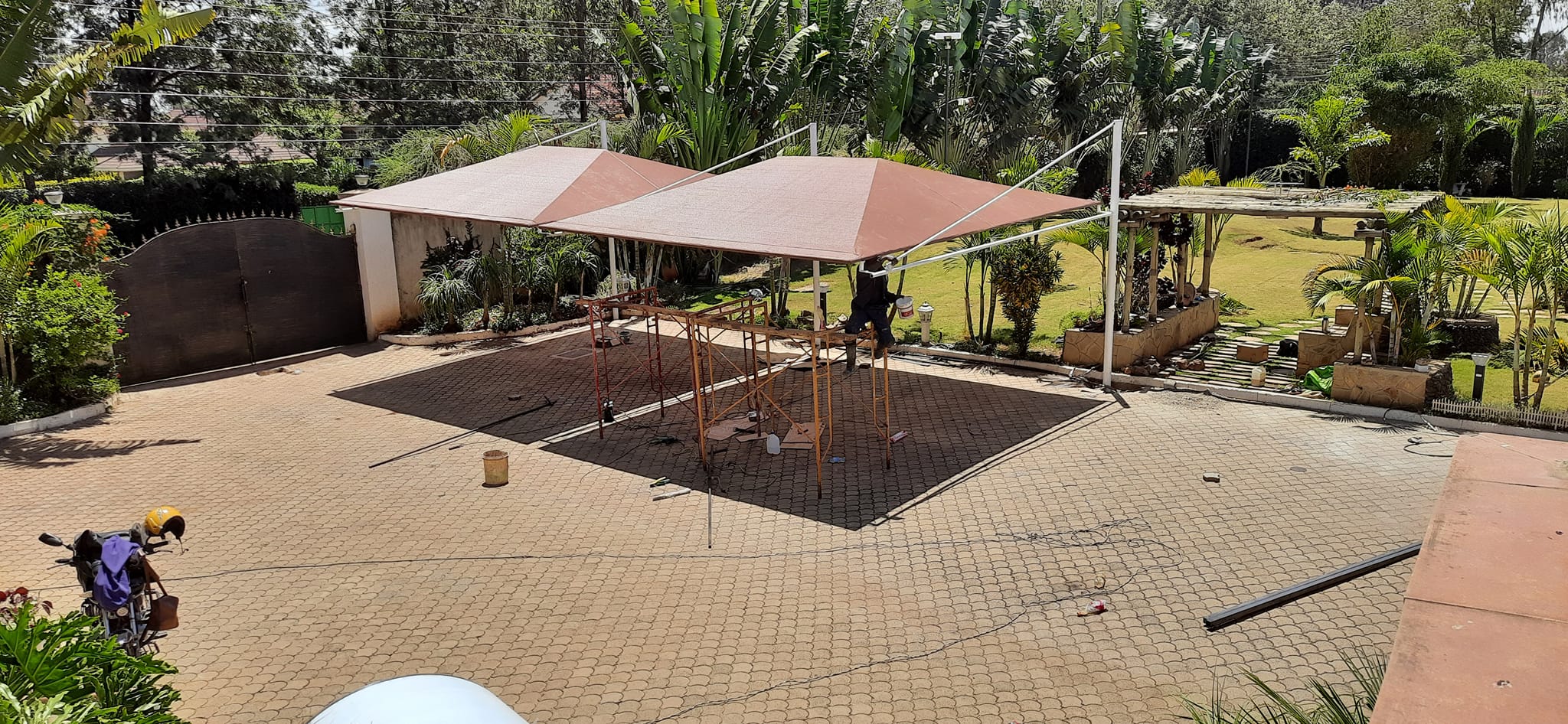 Unique and Modern Car Wash Shades and Carports-Yard Parking Lot Shades-Parking Shades-Vehicle Shade Canopies-Cantilever and Curved Shed designs-Waterproof Shade Net Car Covers-Commercial and Residential Car Shade Installers In Ngong, Nairobi Kenya-