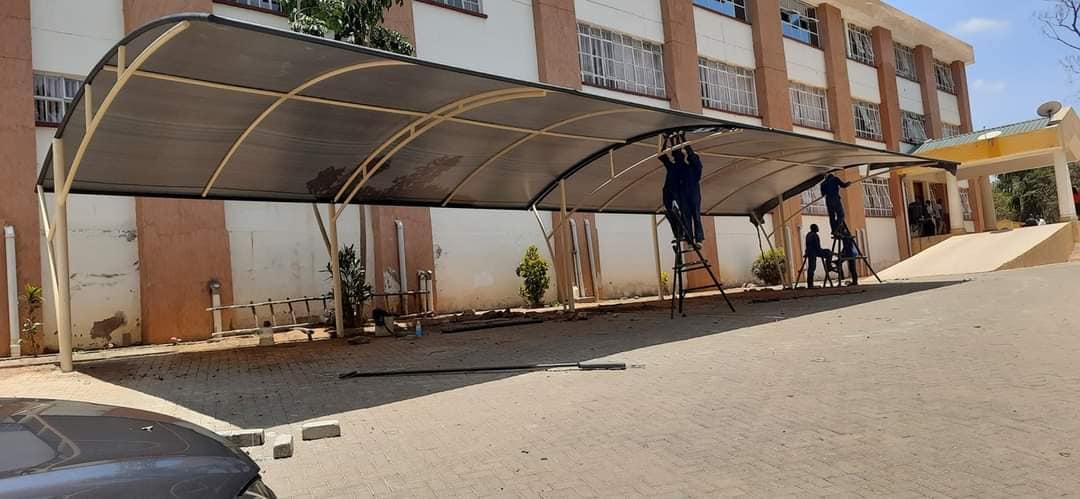 Unique and Modern Car Wash Shades and Carports-Yard Parking Lot Shades-Parking Shades-Vehicle Shade Canopies-Cantilever and Curved Shed designs-Waterproof Shade Net Car Covers-Commercial and Residential Car Shade Installers In Mombasa Road, Nairobi Kenya