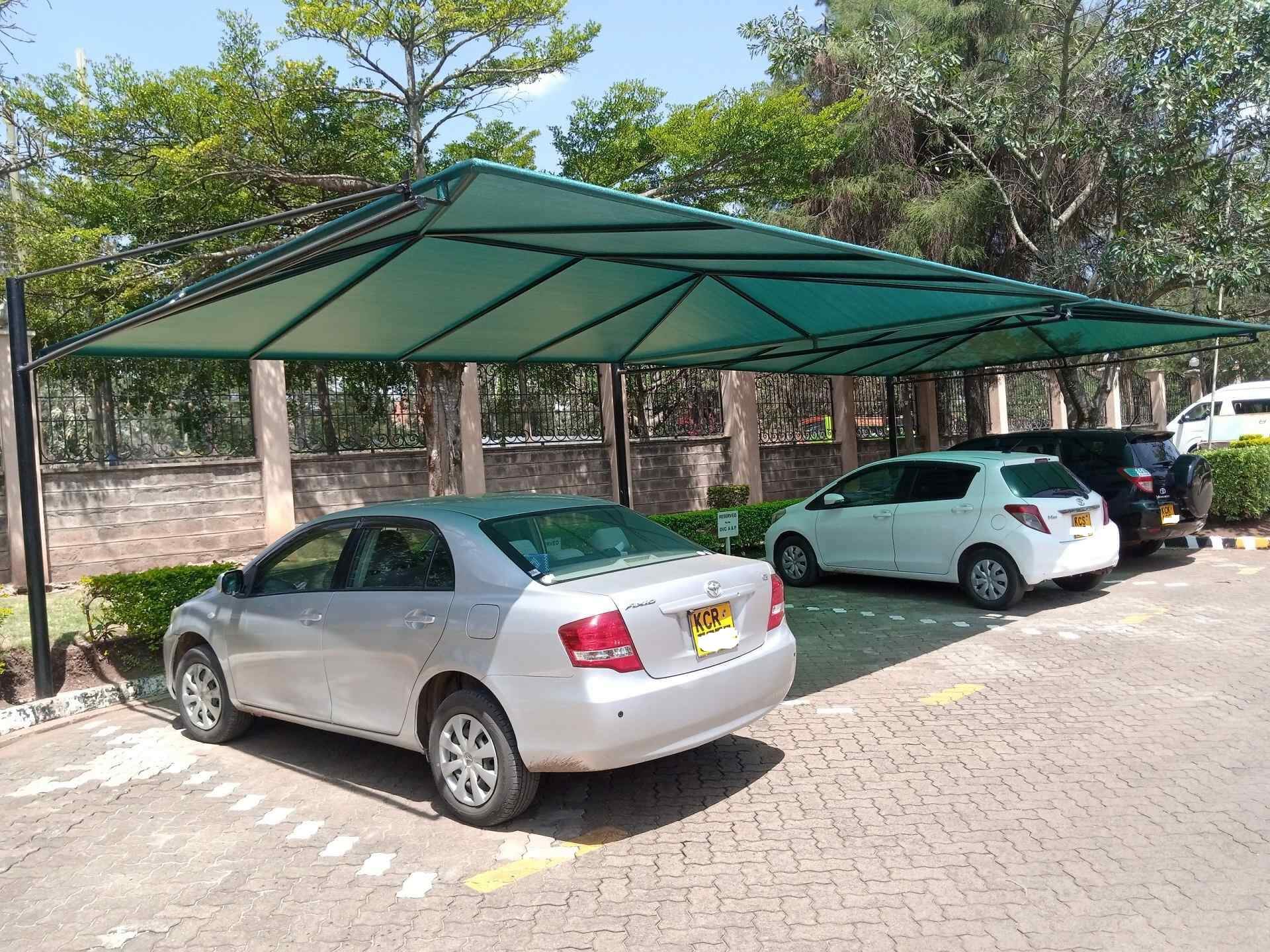 Unique and Modern Car Wash Shades and Carports-Yard Parking Lot Shades-Parking Shades-Vehicle Shade Canopies-Cantilever and Curved Shed designs-Waterproof Shade Net Car Covers- Car Park Shades For Banks-Schools-Library Buildings-Cultural Centers-Police Posts-Military and Army Barracks-Churches-Mosques-Hospitals-Restaurants-Hotels-Resorts-Villas-Homes-Townhouses-Offices-Airports-Factories-Garages-Businnes Parks-Law Firm Offices-Corporate Offices-Commercial and Residential Car Shade Construction Company In Nairobi Kenya-We install the CARPORTS all over the country including RUNDA-GARDEN ESTATE-RIDGEWAYS-THOME-MUTHAIGA-KITUSURU-LORESHO-KYUNA-REDHILL-NYARI-PEPONI ROAD-THIGIRI RIDGE-SPRING VALLEY-RIVERSIDE-Chiromo-WESTLANDS-PARKLANDS-HIGHRIDGE-UPPERHILL-JAMES GICHURU ROAD-LAVINGTON-KILELESHWA-KILIMANI-Milimani-HURLINGHAM-NGONG-KAREN-Ngong Road-LANG’ATA-NAIROBI WEST-NGUMO-MBAGATHI-RONGAI-KISERIAN-INDUSTRIAL AREA-SOUTH C-SOUTH B-MOMBASA ROAD-KITENGELA-ATHIRIVER-KATANI-SYOKIMAU-MACHAKOS-MAANZONI-LUKENYA-NAIVASHA-NAKURU-ELDORET-KISUMU-SIAYA-THIKA ROAD-KAHAWA WENDANI-KAMITI ROAD-JACARANDA-TATU CITY-KIJANI RIDGE-MEMBLEY-KAMAKIS-RUIRU-JUJA-THIKA-THIKA GREENS-KENYATTA ROAD-RUAKA-BANANA-MUCHATHA-KIAMBAA-KARURA-KIKUYU-LIMURU-KIAMBU-UTAWALA-RUAI-KAMULU-JOSKA-EMBAKASI-NYAHURURU-NANYUKI-NARUMORU-TIMAU-ISIOLO-MERU-EMBU-KERUGOYA-KUTUS-NYANDARUA-NYERI-MURANG’A-KARATINA-MANDERA-NAROK-MOMBASA-NYALI-BAMBURI-VIPINGO RIDGE-VIPINGO CITY-KAJIADO-NAROK-GILGIL-NJABINI-KINANGOP-OL KALOU-