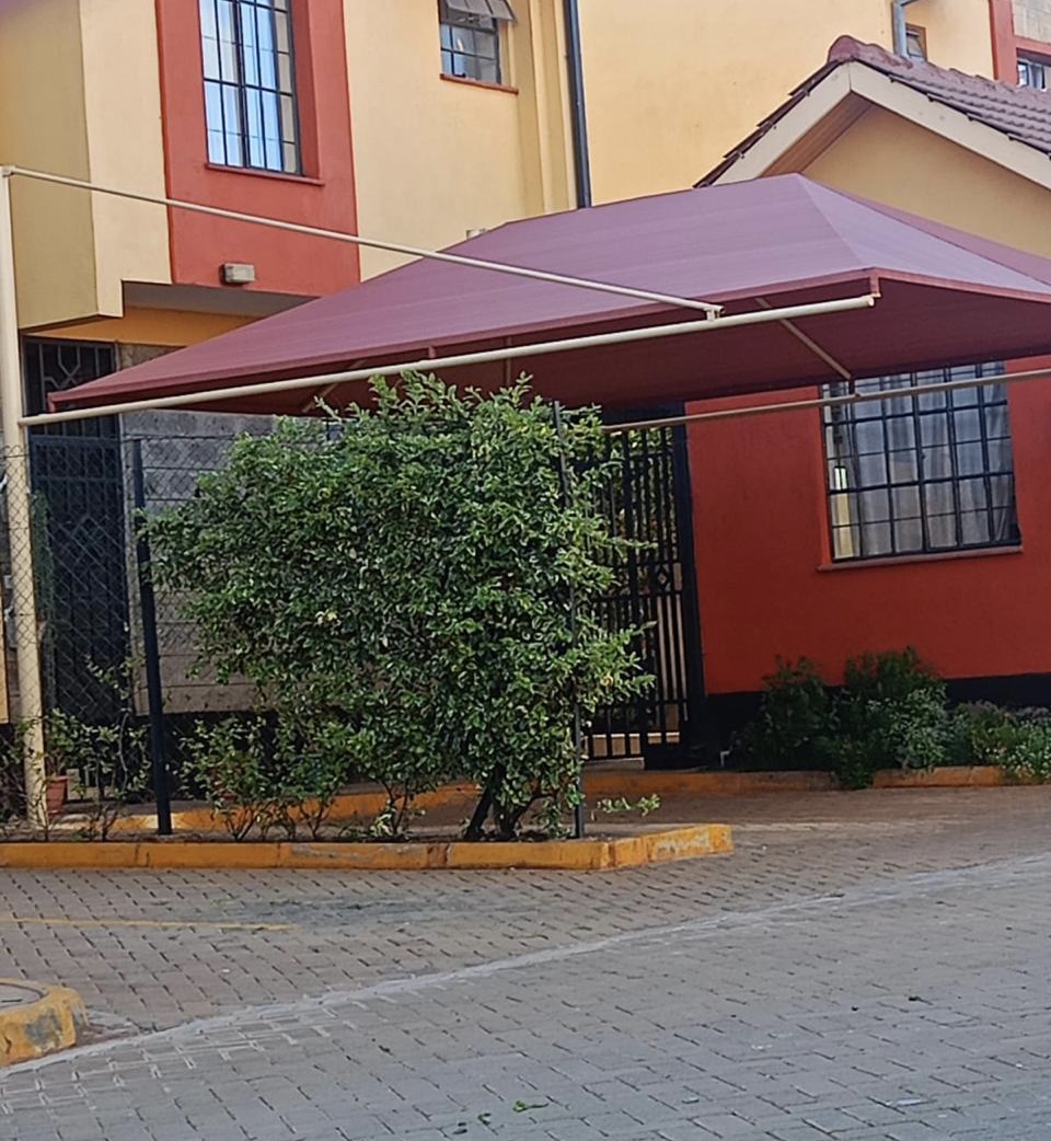 Fabrication and Installation of carports and waterproof parking shades in Kuscco homes – Kitengela