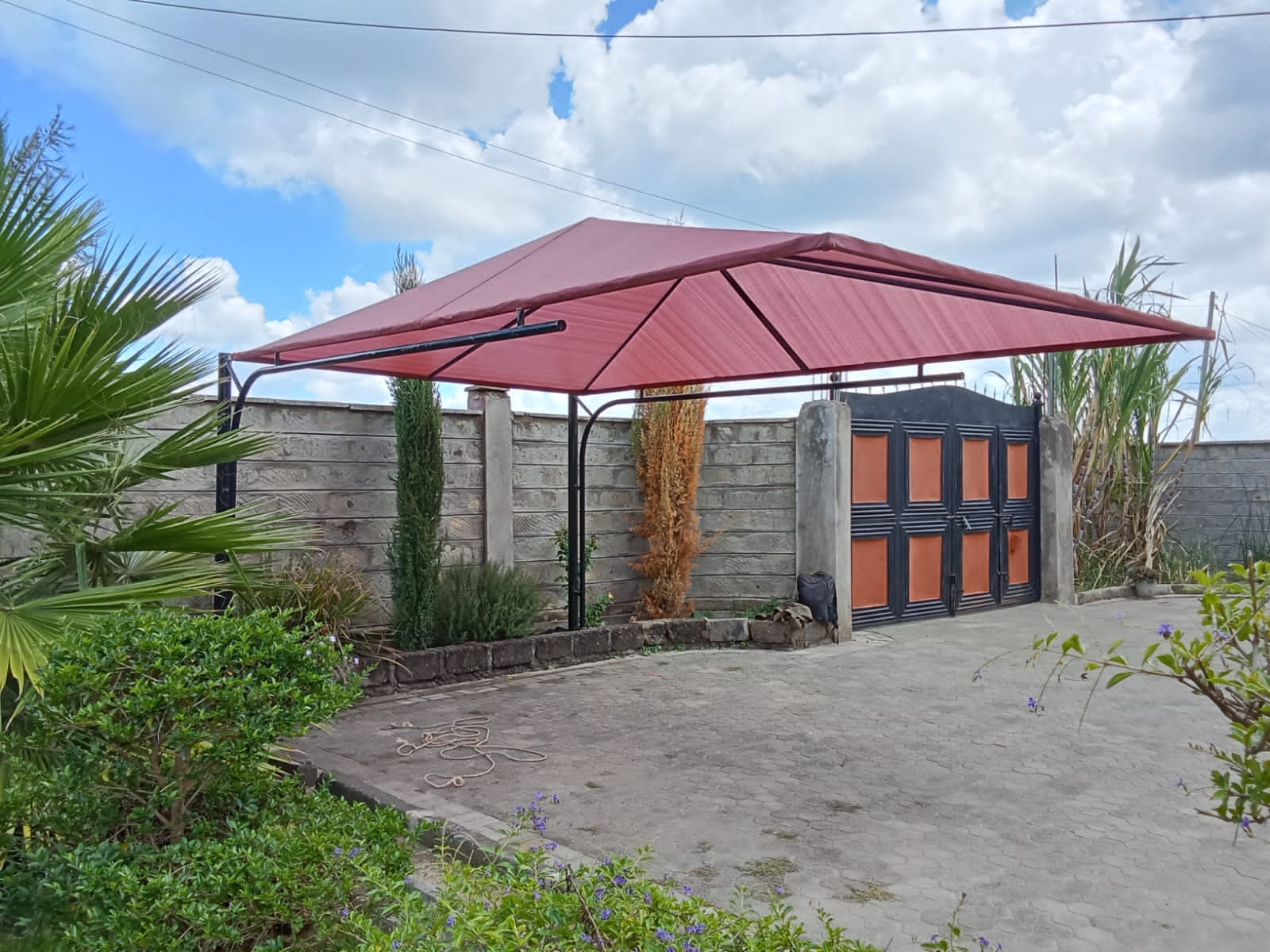 We Fabricate and Install affordable waterproof carports and durable parking shades along Eastern Bypass