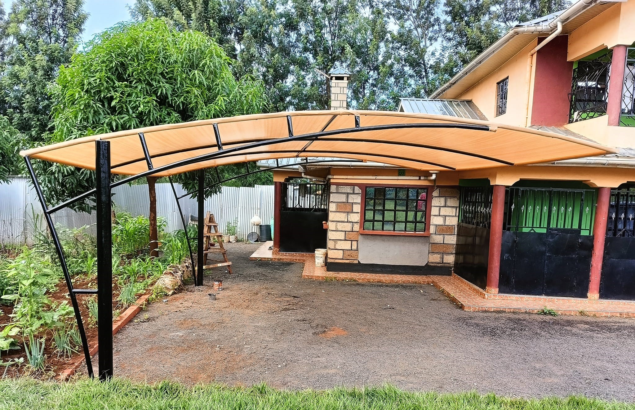 We supply and install waterproof, durable, affordable and high quality car parking shades and outdoor shades in Uganda