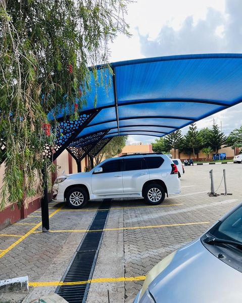 We fabricate, supply and install carports and car parking shades in Mushroom Gardens-Kiambu Road