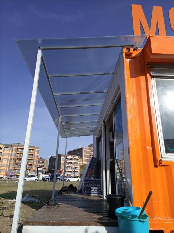 Polycarbonate canopy extension for a container